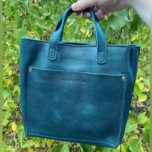 Lagoon Mini Crossbody Bag with a zipper closure